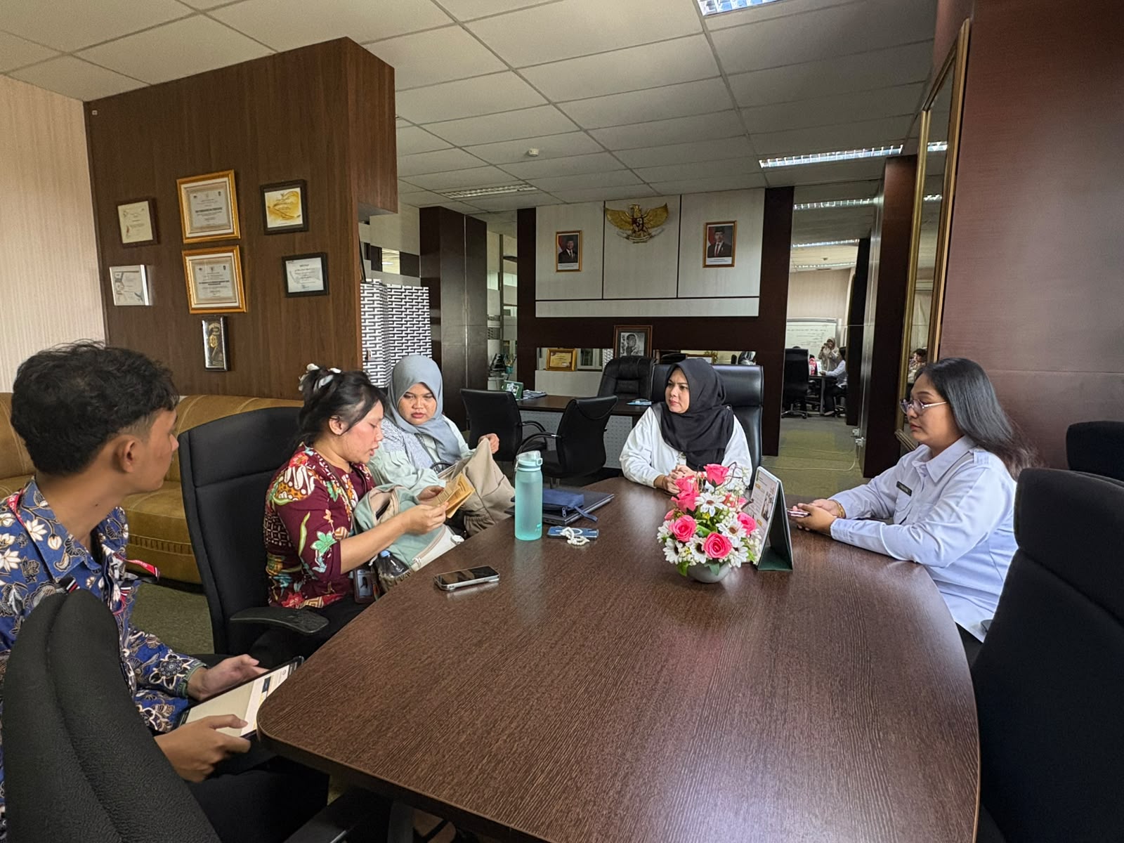 Menghadiri kegiatan Evaluasi Tata Kelola Peningkatan Akses Pembiayaan UMKM Triwulan II Tahun 2026